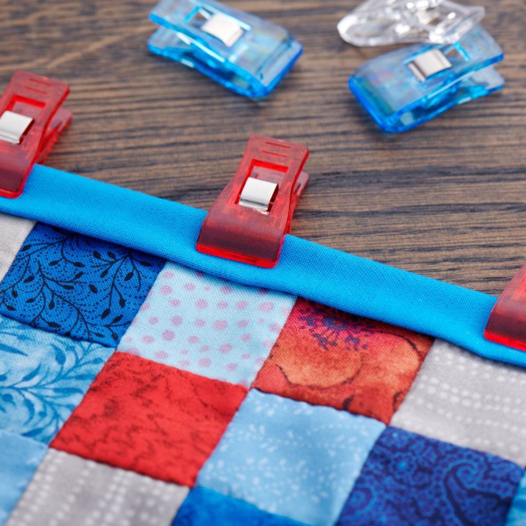 Binding a quilt. Binding a quilt