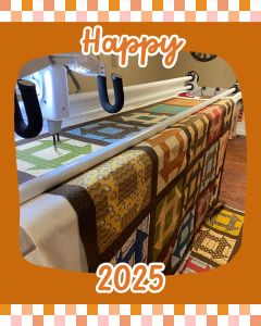 Quilt loaded on a quilting frame.